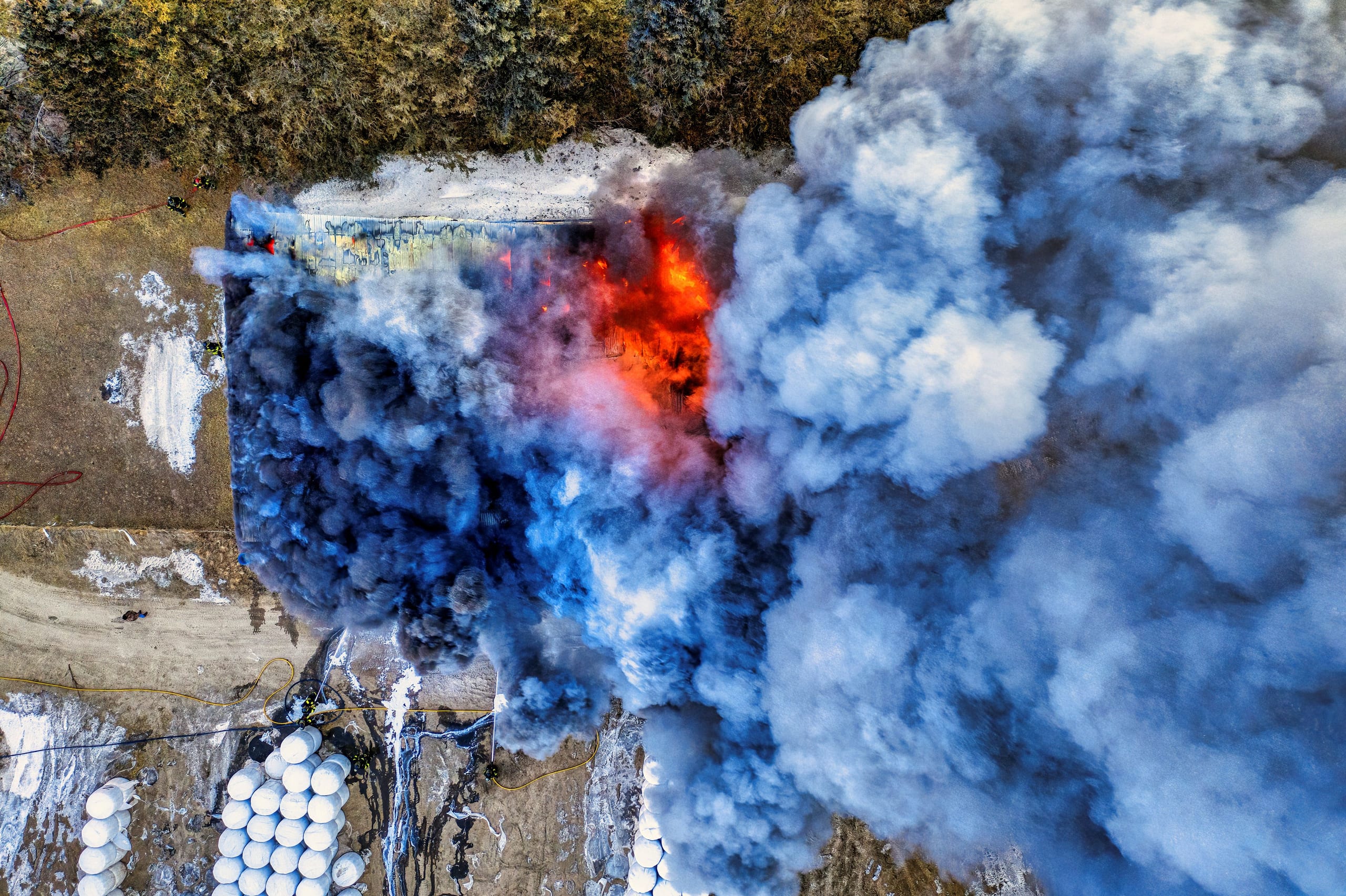 aerial view of an emergency response over a suburb